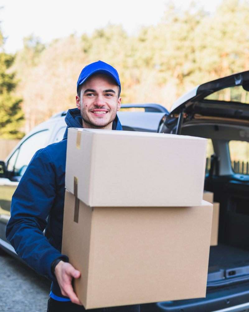 Man holding box, Best Courier Services in Dorset, UK